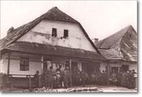 Crowd in front of shop in Tluste